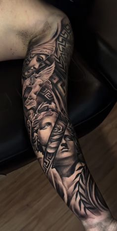 a man's leg with tattoos on it