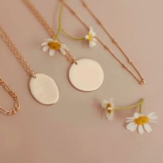 Featuring delicate bursts of floral beauty, our Blossom Posy Pendant is blooming with grace and elegance. Choose those Blossoms that represent the ones you love or simply your favourite combination of gorgeous flowers, and pick out the Posy that means the most. Simply choose up to four flowers/foliage for your oval Blossom Posy and let us design your beautiful bouquet. Like the look of a small pendant next to the Oval Posy? Add it here: Additional Small Pendant Crafted with love in our sunny Bri Rectangle Necklace, Girlie Girl, May Birthday, Personalised Jewellery, Oval Necklace, Symbol Necklace, Gorgeous Flowers, Zodiac Necklaces, Bar Pendant