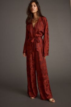 Invite Accepted! All eyes are on you babe in the Noelle Cinnamon Satin Jacquard Jumpsuit. Made from a cinnamon red satin jacquard material, with a belted waist and flare sleeves, the Noelle Jumpsuit brings festive vibes to any occasion. Whether you're toasting at a holiday party or dancing the night away, the Noelle jumpsuit is the gift that keeps on giving. 70s Chic Fashion, Venus Sagittarius, Mauve Hair, 70s Chic, Cinnamon Red, Party Bottoms, Winter Wedding Guest Dress, Fall Sweater Dress, 12th Tribe