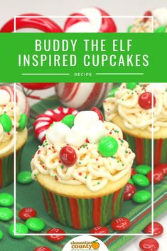 christmas cupcakes with white frosting and candy on top