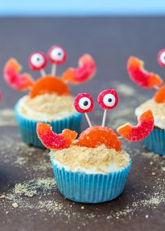 some cupcakes with googly eyes on them