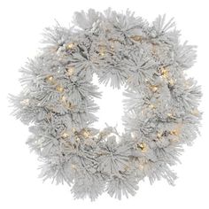 a white wreath with lights on it