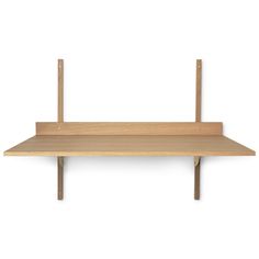 a wooden shelf sitting on top of a white wall