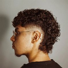 37 Burst Fade Mullet Style Ideas to Try Burst Fade Mullet Perm, Mens Burst Fade Haircut Mullet, Low Mullet Men, Mohawk Curly Hair Men, Natural Curly Hair Mullet Men, Men’s Modern Mullet Curly, Low Burst Fade Curly Hair, Curly Burst Fade Mullet, Mullet With Curly Hair