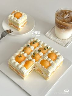 two desserts on plates with drinks and utensils next to eachother