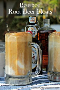 bourbon root beer floats in two mugs on a table