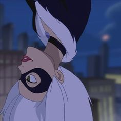 an animated image of a woman with black and white hair wearing a mask on her face