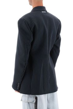 VETEMENTS striped double-breasted jacket made of pure cotton yarn with an hourglass design. It features button closure, peaked lapels, flap pockets, buttoned cuffs. Viscose branded lining, back slits, oversized fit. The model is 187 cm tall and wears a size M. Size Info STANDARD Color Detail Blue Made In Italy Material 100% CO Season One spring Season Two summer Product clothing Brand Vetements Size And Fit Classic Pinstripe Blazer With Double-breasted Button, Classic Pinstripe Double-breasted Blazer, Pinstripe Double-breasted Blazer For Office, Pinstripe Long Sleeve Blazer With Double-breasted Button, Formal Striped Blazer With Double-breasted Button, Striped Formal Blazer With Button Closure, Formal Striped Blazer With Button Closure, Striped Double-breasted Long Sleeve Blazer, Business Striped Double-breasted Outerwear