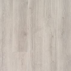 an image of wood flooring that looks like it has been painted in light grey