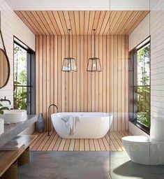 a modern bathroom with wooden walls and flooring