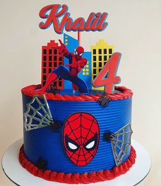 a spiderman birthday cake with the number four on top