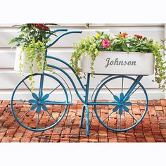 a blue bicycle with flowers in the basket