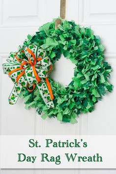 a st patrick's day rag wreath hanging on a door with the words st patrick's day rag wreath