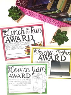 three awards for the lunch on the fun award are displayed in front of books and other items