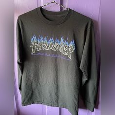 Black Long Sleeve Thrasher Skate Tee, Print On Front Only. Men’s Small 100% Cotton Nwot Bought By My Teen Son, Laundered But Never Worn. Purple Letter Print Tops For Streetwear, Urban Purple Letter Print Top, Pre-shrunk Purple Shirt For Streetwear, Purple Band Merch Top For Streetwear, Purple Logo Print Tops For Streetwear, Long Sleeve Purple Tops For Streetwear, Purple Long Sleeve Tops For Streetwear, Purple Letter Print Shirt For Streetwear, Casual Purple Shirt For Streetwear