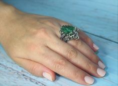 Raw Malachite Spider Silver Ring - Sterling Silver Druzy Vintage Style 925 Silver Ring, Boho Chic Ring, Trendy Ring, Large Gemstone Ring The ring is manually assembled directly on the stone. Each ring is individual and unique. The texture of plisse malachite resembles the interweaving of overgrown branches of a shrub, and the luster of the polished surface is akin to the dull flicker of twisted silk. Such a stone can be used in contrast with turquoise malachite - mainly as a low-expressive backg Green Handmade Fusion Rings, Fusion Style Emerald Jewelry Gift, Fusion Style Emerald Jewelry For Gifts, Fusion Style Emerald Jewelry As A Gift, Emerald Fusion Rings As A Gift, Green Fusion Jewelry For Gifts, Unique Hand Cast Green Jewelry, Unique Green Jewelry With Stone Setting, Unique Green Hand Cast Jewelry