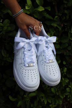 Step into personalized elegance with our exquisite collection of wedding sneakers tailored specifically for brides. Each pair epitomizes the perfect blend of style and comfort, ensuring that your journey down the aisle is not only memorable but also exceptionally comfortable. Our bride's wedding sneakers are meticulously crafted to reflect your individuality, offering customizable options such as adding your name and wedding date, all in a range of fonts and colors to match your unique vision. W Sneakers For Bride, Wedding Sneakers For Bride, Shoes Air Force, Bride Personalized, Bridal Sneakers, Wedding Sneakers, Colorful Sneakers, Custom Air Force 1, Personalized Shoes