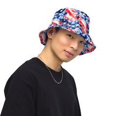 Inspired by the patriotic spirit and timeless symbol of freedom, our American Flag Bucket Hat celebrates the beauty of the stars and stripes in a stunning and fun way. This hat is a perfect blend of style and comfort, allowing you to express your love for your country. This reversible bucket hat can be worn on both sides, making it easy to match with different outfits. Made of breathable premium fabric, this hat will become your go-to streetwear accessory. • Made to order. • American Flag Waterc Adjustable Patriotic Hat For Outdoors, Adjustable Patriotic Outdoor Hat, Trendy Cap For 4th Of July, Red Patriotic Summer Hat, 4th Of July Beach Cap, Adjustable Hats With Curved Brim For 4th Of July, Adjustable Hat For 4th Of July Outdoor, Adjustable Hats For Outdoor 4th Of July, Adjustable Curved Brim Hats For 4th Of July