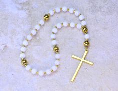 Handmade protestant prayer beads made with , natural white  Jade beads 8mm , golden Hematite  beads 10mm, findings and religious cross pendant. Protestant prayer beads  Length from the top bead to the bottom of cross is about 11 inches. Please check out our SHOP POLICY and SHOP ANNOUNCEMENT before you make any payment, thank you. http://www.etsy.com/shop/ryhcreations/policy Thanks for taking a look and stopping by my shop! Protestant Prayer Beads, Pocket Rosary, Religious Cross, White Jade, Celtic Cross, Hematite Beads, Jade Beads, San Antonio Tx, Prayer Beads