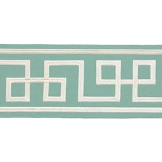 a green and white border with squares on it