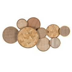 four woven coasters are arranged on top of each other in the shape of circles