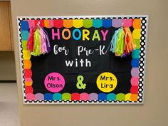 a classroom bulletin board with colorful tassels on it's edges and the words hooray for prek - k with mrs & mrs