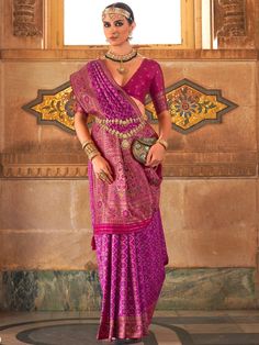 With its beautiful traditional look, the outstanding purple-weaving silk traditional saree is the perfect choice for weddings, festivals, and other special occasions. Made from high-quality silk material, this saree features exquisite zari weaving work all over, adding a touch of elegance and sophistication. The purple color adds a regal charm to the saree, making it a statement piece in your wardrobe.
The saree measures 5.50 meters in length and comes with an unstitched blouse material in a sim Purple Saree, Traditional Saree, Organza Sarees, Ghagra Choli, Half Sleeve Blouse, Art Silk Sarees, Rich Purple, Zari Work, Blouse Material