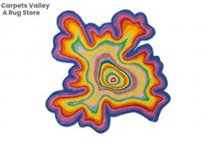 an image of a colorful object that is in the shape of a flower with text reading carpet valley a rug store