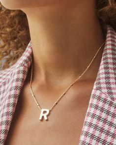 No need to spell it out...The Letter R Pendant Necklace in Silver is sure to be a new favorite. Featuring your initial, or your bestie's, or your crush's (we won't tell), wear a personalized reminder designed with our signature etched detail.,MetalRhodium Over Brass Size19 chain, 0.53L X 0.61W pendantClosureLobster clasp with single adjustable sliding bead Please note: Due to the one-of-a-kind nature of the medium, exact colors and patterns may vary slightly from the image shown.} | Kendra Scott R Initial Necklace, The Letter R, Trendy Fashion Jewelry, Unique Wedding Gifts, Letter R, Girls Necklaces, Simple Necklace, Initial Necklace, Kendra Scott