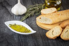 bread, garlic and oil on a table