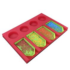 five trays with different colored beads in them