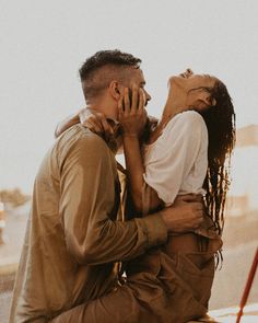 a man and woman sitting next to each other