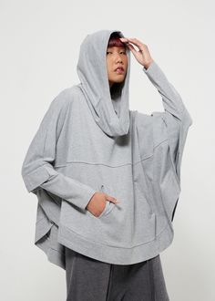 Killer cool in one easy piece with pullover hood sweater. Features an oversized roomy hood, batwing sleeves with cuffed, a kangaroo pocket and rounded hem. Dreamy to wear day to night. DETAILS: ▪ Hooded ▪ Dropped shoulder ▪ Batwing sleeves with cuffed ▪ A kangaroo pocket ▪ Rounded hem MEASUREMENTS: Bust: 76" (193 cm) Sleeve length (from side of neckline): 27" (68.5 cm) Cuff Sleeve: The cuff can stretch from 8" (20 cm) up to 12" (30.5 cm)-round Hips: 60" (152.5 cm) Sweater length from shoulder to Sweater Aesthetic, Womens Hoodies, Aesthetic Hoodie, Hooded Sweater, Hooded Pullover, Batwing Sleeve, Hoodie Sweater, Cuff Sleeves, Dolman Sleeve