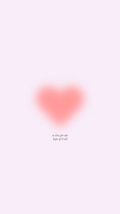 a red heart on a light pink background