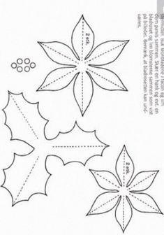 an image of paper flowers and leaves on the side of a piece of white paper