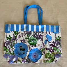 New Without Tags Canvas Tote With A Really Pretty Floral / Poppy Print. It's Pretty Large And Would Be Great For The Beach Or Casual Outings The Interior Of The Tote Is Lined Approximately 19.5" Long 12.5" Tall (+8.5" For Handles) 5" Wide On The Bottom Blue Floral Print Bag For Vacation, Blue Floral Print Vacation Bag, Blue Floral Print Vacation Bags, Blue Floral Print Bags For Shopping, Blue Floral Print Shopping Bags, Poppy Print, Patchwork Bags, Estee Lauder, Large Canvas