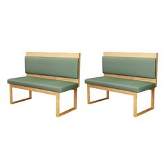 two wooden benches sitting next to each other on top of a white background with green cushions