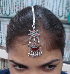 VINTAGE ANTIQUE TRIBAL OLD SILVER HAIR ORNAMENT TIKA FROM RAJASTHAN INDIA. NICE HANDMADE DESIGN, GOOD FOR ETHNIC JEWELRY COLLECTOR OR FOR TRIBAL STYLE BELLY DANCE.Note - Please check pictures carefully for more detail.Total Long - 21 cm(8.2")weight - 16.5 gramsMaterial - silver & original old worn piece.