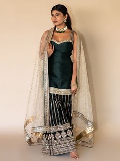 Shop Indian bridal sharara in USA: This stunning bottle green & cream bridal sharara with sequin & threadwork is perfect for your nikah. Indian wedding wear store in Fremont Bay Area Shipping Worldwide to UK, USA, Canada, Germany, Australia. Green Floor-length Palazzo Set For Wedding, Green Palazzo Set With Gota Work For Wedding, Green Palazzo Set For Wedding During Diwali, Green Palazzo Set For Wedding And Diwali, Green Sharara With Gota Work For Reception, Green Cutdana Sharara For Wedding, Green Zari Work Palazzo Set For Wedding, Green Sharara With Traditional Drape For Wedding, Green Sharara For Wedding And Navratri