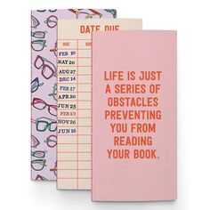 three notebooks with the words life is just a series of obstacles preventing you from reading your book