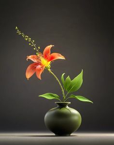 a green vase with a flower in it