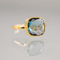 "London Blue Topaz Birthstone Ring. Available in 18K Gold Vermeil or 925 Sterling Silver. Please select size and metal option from drop down menu. This listing is for the following 1 (ONE) ring: ✦Gemstone: London Blue Topaz Quartz ✦Stone Cut: Square, Round, or Teardrop ✦Stone Size: Approximately 9mm (0.35\") ✦Metal: 18K Gold Vermeil or 925 Sterling Silver *Because we use natural stones, the stones may vary slightly in shape, size and color. *Each item is packaged individually in a GIFT BOX Pleas Blue Topaz Ring Gold, Topaz Birthstone Ring, Gold Topaz Ring, Stackable Birthstone Rings, December Birthstone Ring, Topaz Birthstone, Green Amethyst Ring, Gold Rings Stackable, Ring Bezel