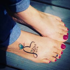 a woman's foot with a tattoo on it