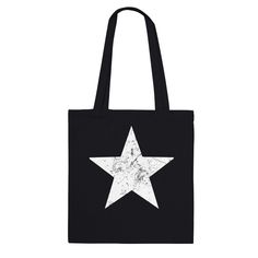 "Tote bag/Shopping bag with pretty cool styled with a large distressed star and ABP logo. Stars have been used throughout history to represent various concepts such as power, guidance, inspiration and resilience. Very strong and smooth fabric. Reinforced stitching on handles. A fantastic gift for individuals with a sense of style and fashion. Also the ultimate companion for all your festival adventures, everyday essentials, short trips, shopping grocery or for the 4th of July celebration. Very nice gift idea for people whose heart truly lies for the USA - the land of the free and the home of the brave! We are delighted for our exclusive collaboration with the esteemed audiovisual storyteller Andrew B. Powers and are pleased to be able to offer his works here. Designed with ❤️ in California Black Star-shaped Shoulder Bag For Everyday Use, Trendy Distressed Bag For Daily Use, Trendy Distressed Bag, Trendy Everyday Distressed Bag, Trendy Everyday Distressed Bags, Everyday Distressed Tote Bag, Concert Bag, Concert Bags, Star Bag