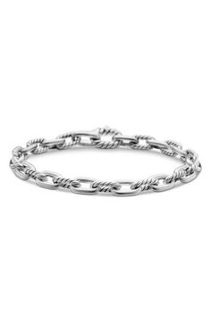 This chunky chain bracelet features alternating twisted and smooth links made of sterling silver and adds polished shine to any wrist stack. Push-clasp closure Sterling silver Imported Classic Sterling Silver Bracelet With Silver Chain, Classic Sterling Silver Cable Chain Bracelets, Classic Silver Cable Chain Bracelet, Classic Chain Bracelet With Lobster Clasp, Classic Polished Chain Link Bracelets, Classic Sterling Silver Oval Link Bracelet, Classic Link Chain Bracelet With Sterling Silver Clasp, Timeless Sterling Silver Oval Link Bracelet, Timeless Sterling Silver Bracelet With Oval Link