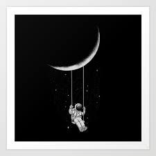 an astronaut floating in the air next to a crescent moon and hanging from strings above his head