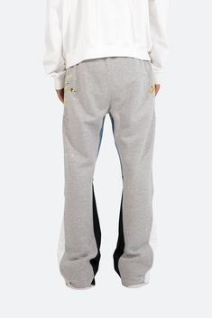 the Contrast Bootcut Sweatpants are designed with a relaxed fit throughout, featuring an elasticized self waist and leg opening, multi-colored paint splatter throughout, and finished with denim and contrasting panels at the inseam and outseam to provide a flare at the leg opening. details relaxed fit flared leg opening 55% cotton 45% polyester model is 6’1, 140 lbs and wears a size medium Bootcut Sweatpants, Sweatpants Fits, M65 Jacket, Fuzzy Cardigan, Denim Patches, Denim Flares, Paint Splatter, Chinos Pants, Black Cardigan