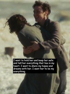 a man and woman hugging on the beach with a quote about her being in love