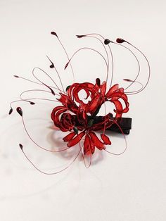 Elevate your style with the enchanting Red Equinox Flower Hairclip, a stunning accessory inspired by the captivating beauty of the spider lily flower. This exquisite hairclip features meticulously crafted petals in rich red hues, capturing the essence of the equinox flower's elegance and mystique.  The price is for a hairclip only, others are not included.  A: A small-sized hairclip.  B: A medium-sized hairclip. Spider Lily Clothes, Red Flower Hair Accessories For Party, Elegant Red Hair Accessories With Handmade Flowers, Red Handmade Flower Hair Accessories For Party, Red Hair Accessories With Handmade Flowers For Party, Elegant Red Hair Accessories For Gift, Elegant Red Hair Accessories For Gifts, Elegant Red Hair Accessories As A Gift, Elegant Red Hair Accessories Gift