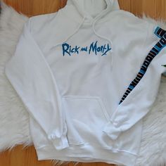 Rick And Morty White Logo Art Pullover Hoodie 210725bk 221206li Clemson Sweatshirt, Plain Black Hoodie, Rick And Morty Hoodie, Armor Hoodie, Beach Sweatshirt, Orange Hoodie, Logo Art, University Sweatshirts, Pullover Shirt